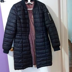 Woman's long puffer jacket.